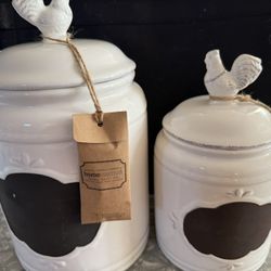 Two White Home Essentials Canisters with Rooster Lids