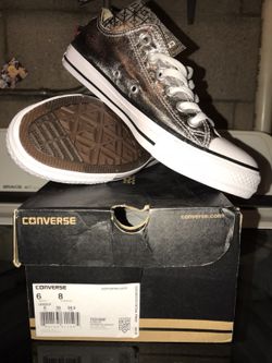Brand new women’s silver metallic converse size 8