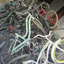 Massive amount of bicycles frames wheels tires etc 