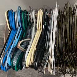 100 Clothes Hangers – Great Condition