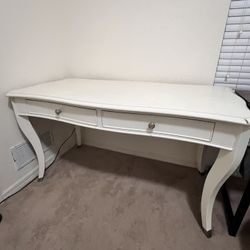 Desk And A Coffee Table 