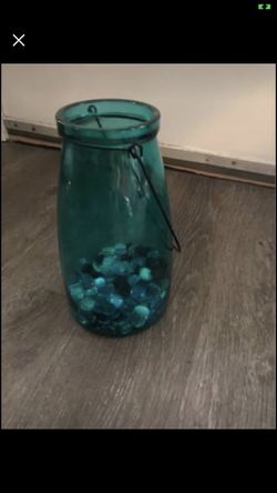 Glass teal colored candle holder
