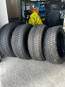 Set of 4 winter stud tires 225/50R17 98T