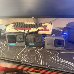 GoPro 12 Black, GoPro Hero 4k, GoPro Hero 5 And Tons Of accessories And Lifetime Warranty 