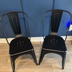 Two Black Metal Chairs 