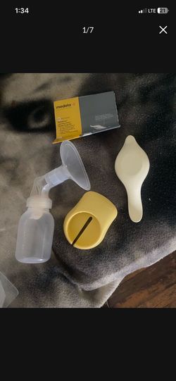 Manual breast pump and   New breast pump replacement parts set. Complete accessories only (no pump motor included).