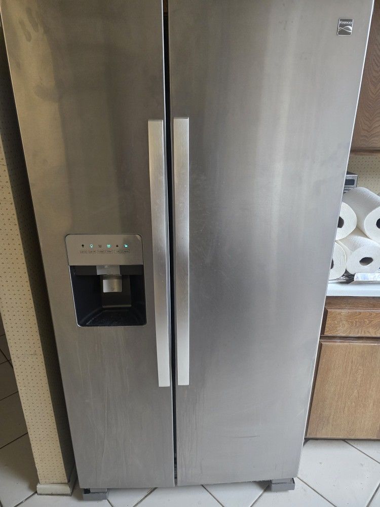 NEWER LARGE STAINLESS SIDE BY SIDE REFRIGERATOR MUST SELL NOW