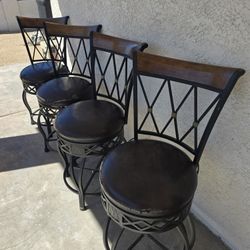4 Kirkland Swivel Barstools