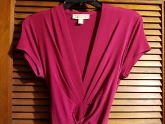 Authentic Michael Kors faux wrap high low dress. Size 4 but runs very large, can fit ladies size 10. Only worn once!