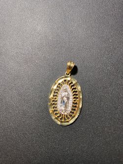 10k real solid gold pendant 1.25” 1.6gr