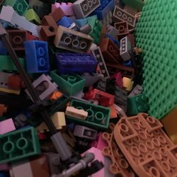 Lego box with legos and characters