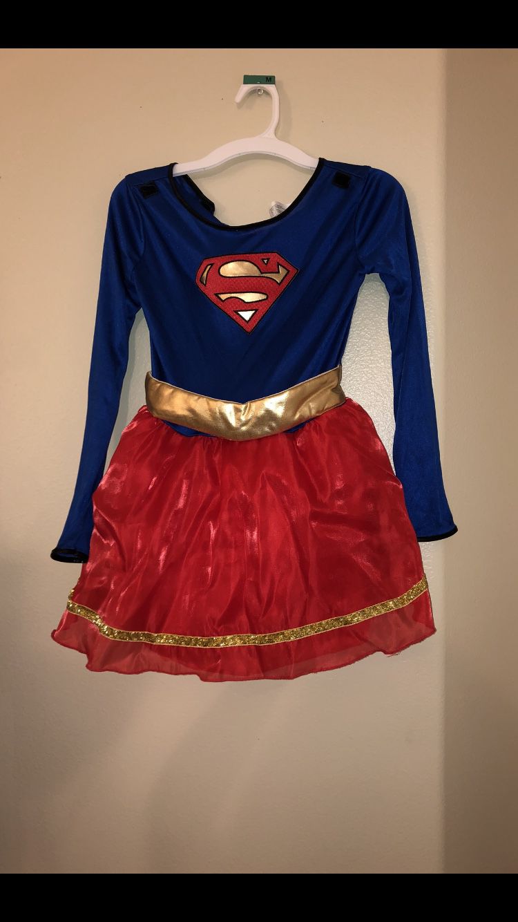BIG GIRLS SUPER GIRL COSTUME COMES WITH ORIGINAL PACKAGING SIZE (MEDIUM)