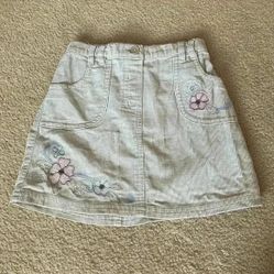 Next - 2 to 3T - corduroy skirt with embroidered  flowers 