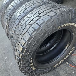 4 used tires Lt275 70r18 Cooper Dicoverer AT3 $180.00 ALL 4