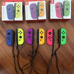 3 sets of Nintendo Switch JoyCons (w/ Original Boxes) + Charging Dock & Controller Grip