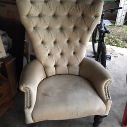 Winged armchair