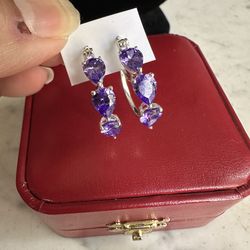 925 Sterling silver 3 pear shaped purple Cz earrings , marked STS 925 , these are gorgeous ! Hoop earrings ,