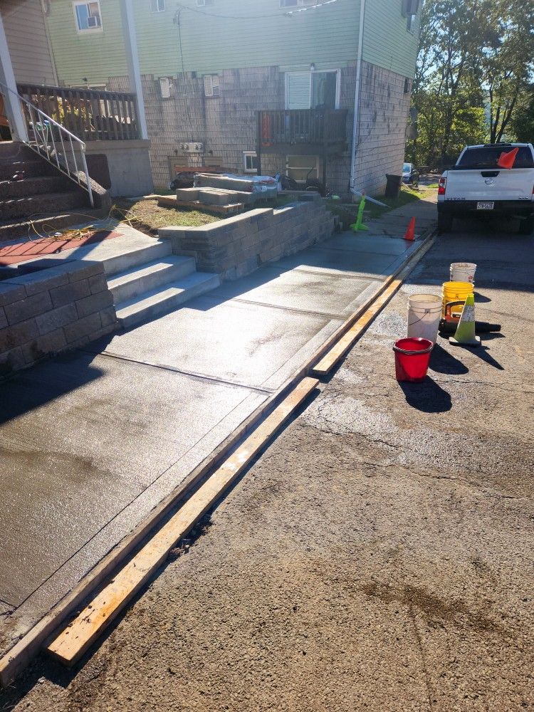Sidewalk, Curb And Retaining Wall