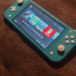 Nintendo Switch Lite With Pokémon Arceus And Ark Survival 
