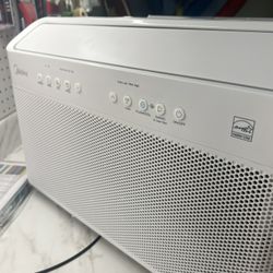 Midea U shaped air conditioner w/ remote 12,000 BTUs New in box