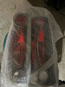 Clear Tail Light Assembly with Red Lenses