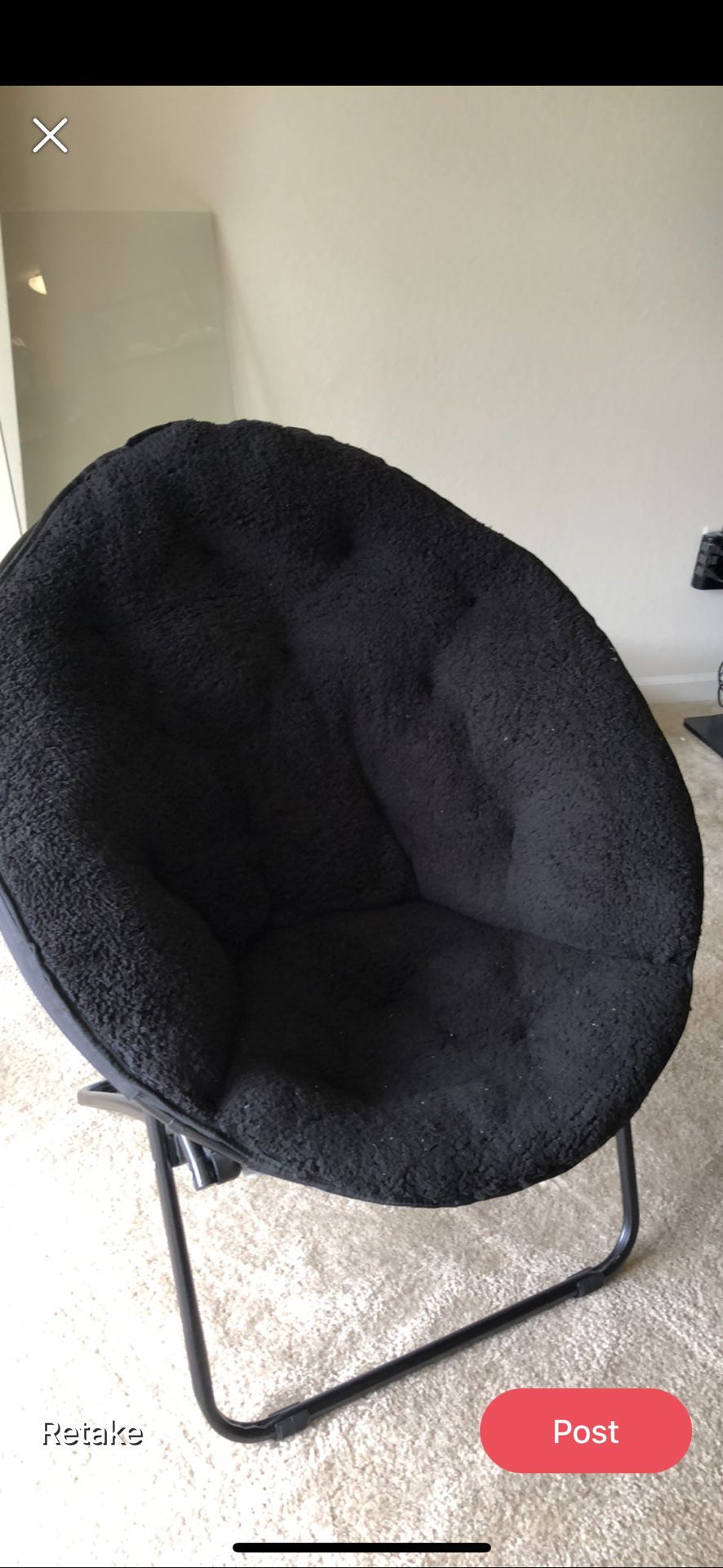 Black saucer chair