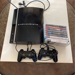 PS3 With 2 controllers, Plus 9 Games