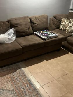 Dark brown five seat couch