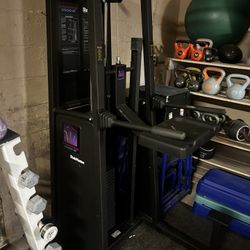 Pull up machines with weights to assist