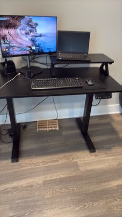 Adjustable height desk