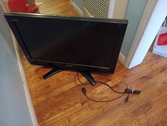 Toshiba TV  31 & 1/2" wide