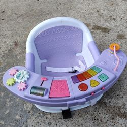 Infantino Music & Lights 3-in-1 Discovery Seat & Booster, Toddler Booster Seat for Dining or Kitchen Chair, Baby Activity Center & Snack Tray, $40