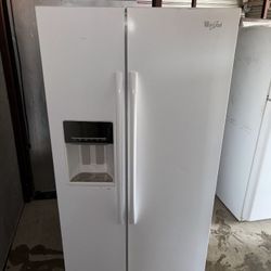 White Whirlpool Refrigerator And Freezer