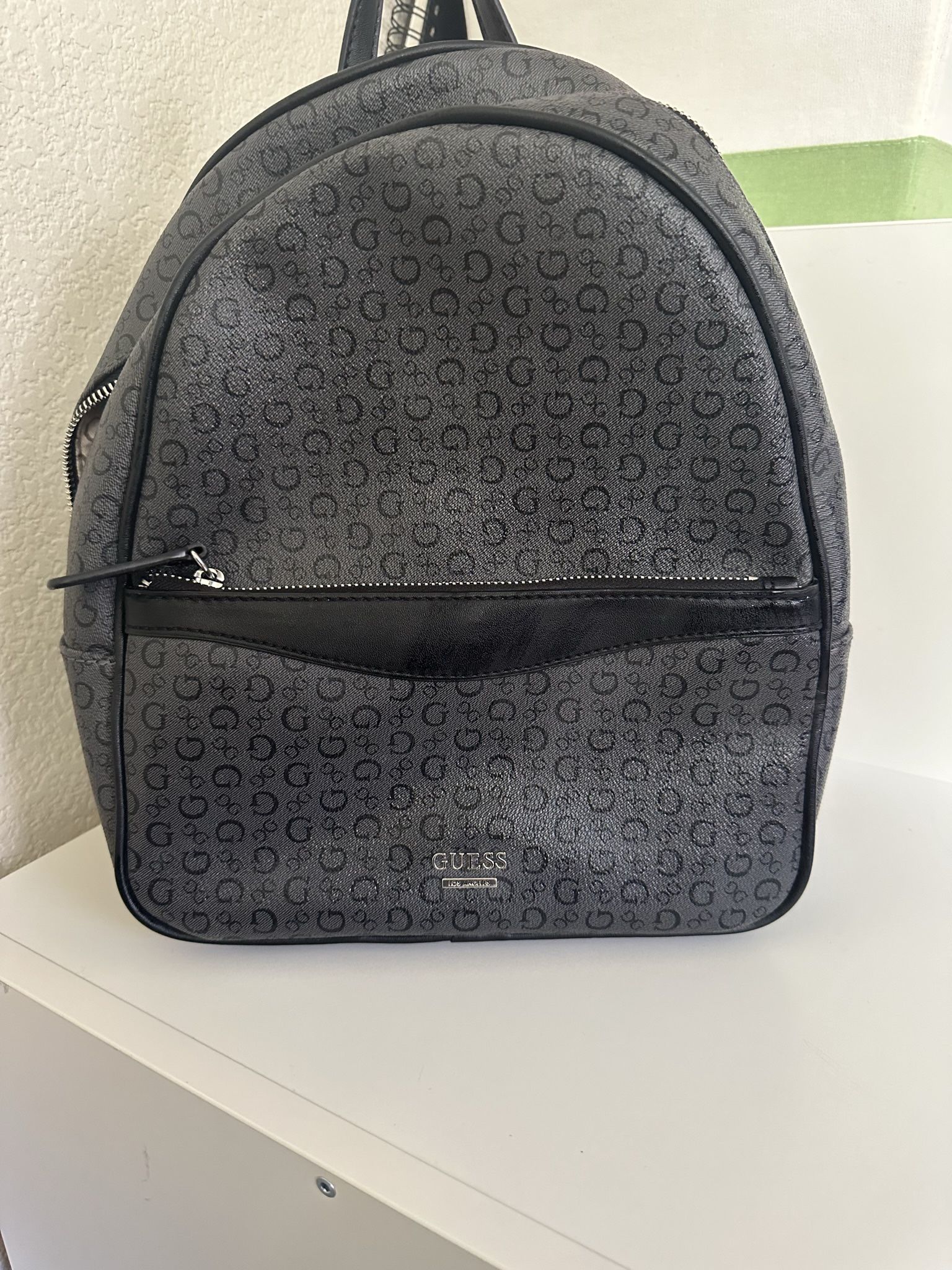 $20 GUESS (small Backpack)