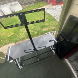 Clean Tv stand with 3 Glass shelves 