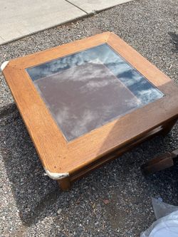Coffee table with peek a boo drawer