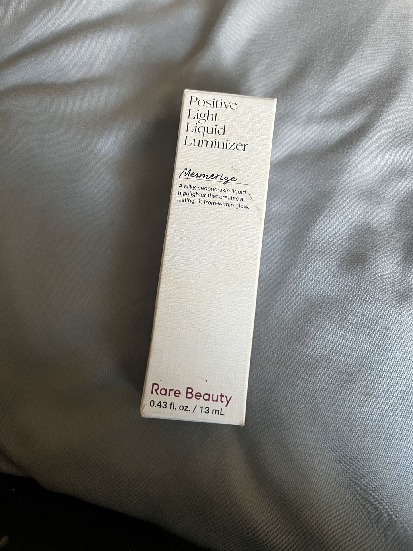 Rare Beauty liquid highlighter shade “mesmerize”