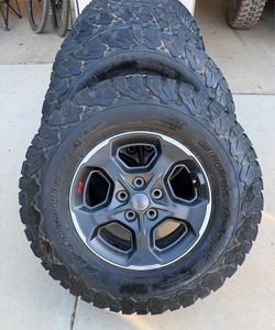 Set of 4BFGoodrich KO2 Tires + Factory Jeep Rubicon Wheels