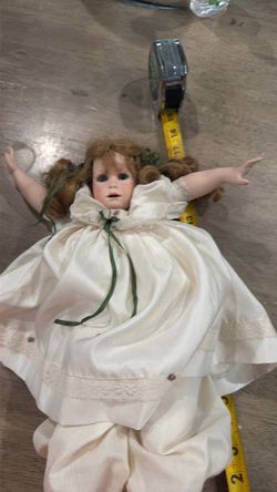 Vintage Porcelain Doll with Cream Dress