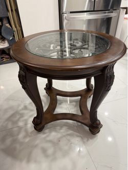 Mesa auxiliar redonda de madera maciza con vidrio