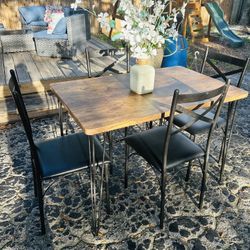 Table And 4 Chairs 