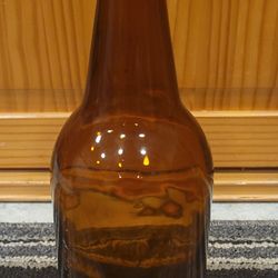 Vintage Brown Glass Bottle

F-587 - L - 79, 10.5" Tall