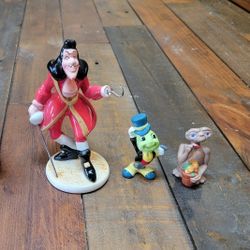 Disney Figurine Lot (Goofy, Pluto, Cricket, Hook) Plus ETDisney Figurine Lot (Jiminy Cricket, Captain Hook) Plus ET collectible