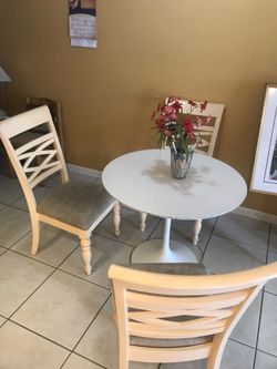 Table and four chairs