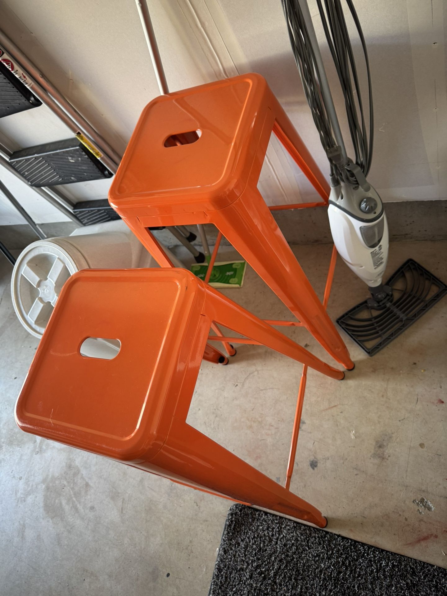 Orange Metal Matching Stools