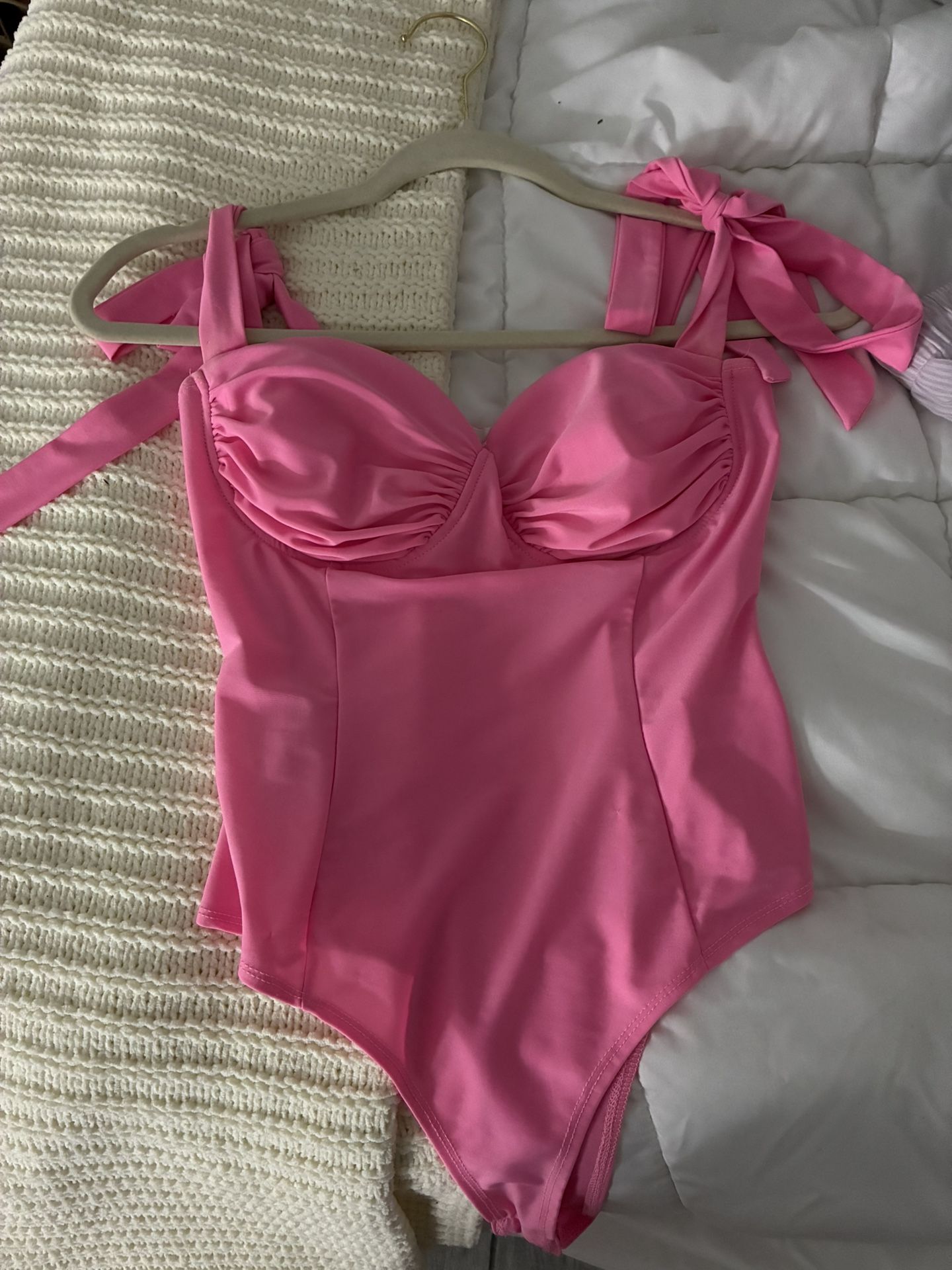 pink bodysuit