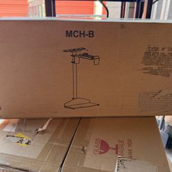 Knob-operated adjustable CPU Holder