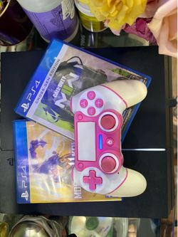 PS4 with games and controller