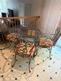 Glass dining table with 4 chairs