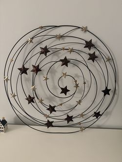 Metal swirl wall decor with stars black/brown & copper